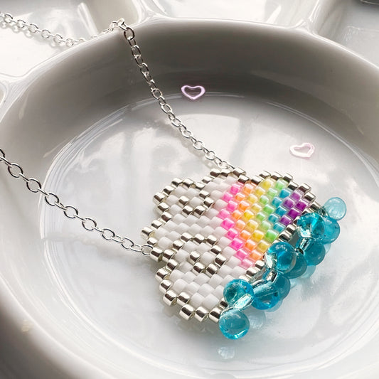 Raincloud necklace with fluorescent UV rainbow beads