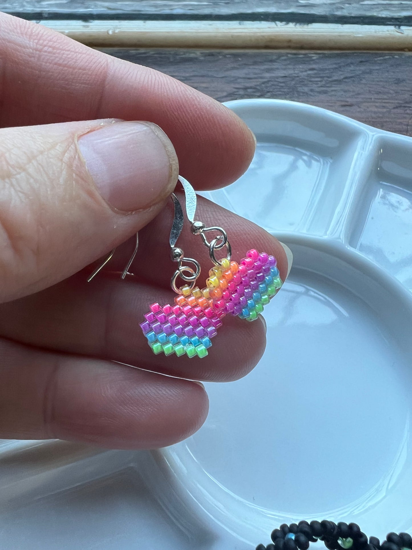 Rainbow heart earrings in florescent blacklight beads