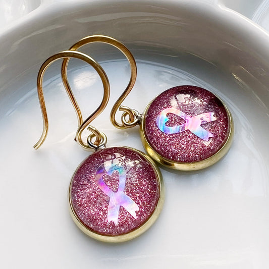 The pink ribbon earrings (gold or silver)