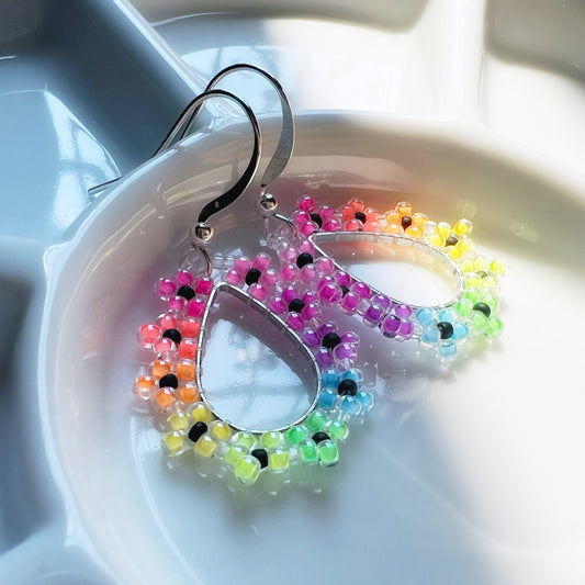Rainbow flower drop earrings in florescent blacklight beads