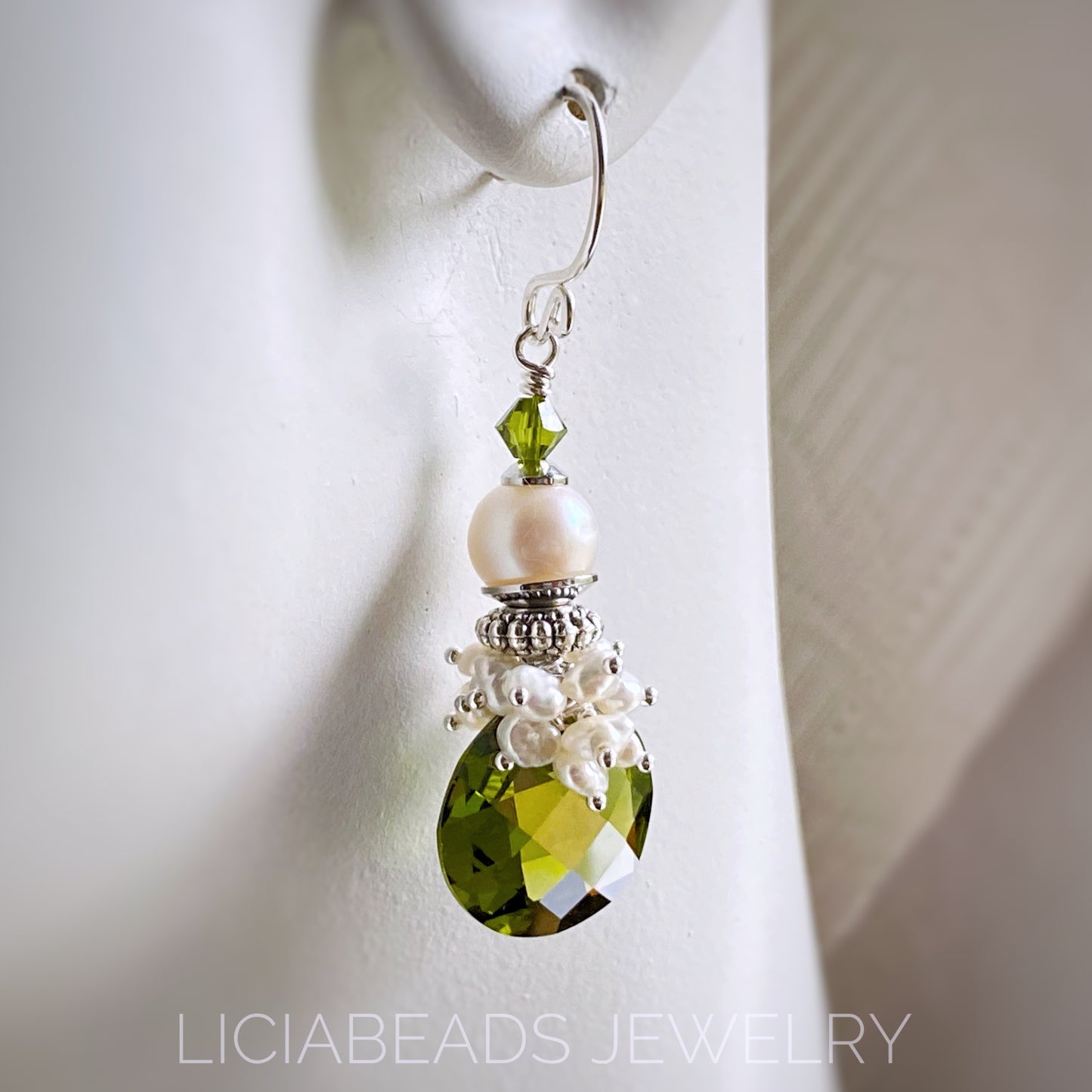 Manhattan Olive, green cubic zirconia and freshwater pearls