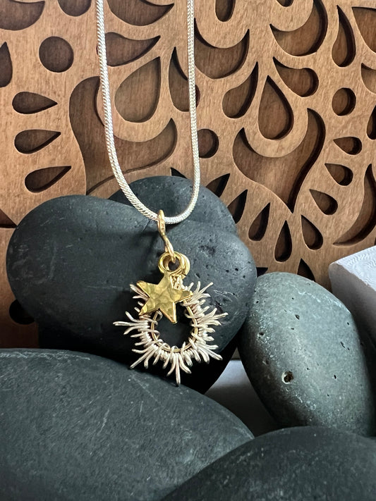 Tiny Starburst Necklace with gold star. The Celestial Collection.
