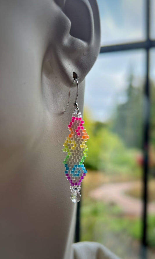 Raindrop cloud earrings in florescent blacklight beads