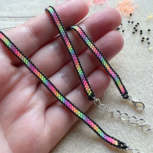 Florescent black banded bracelet (mini bead size)