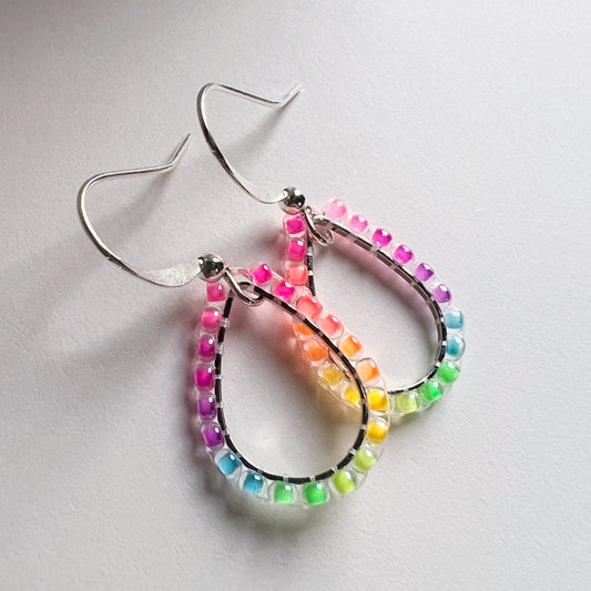 Rainbow drop earrings in florescent blacklight beads