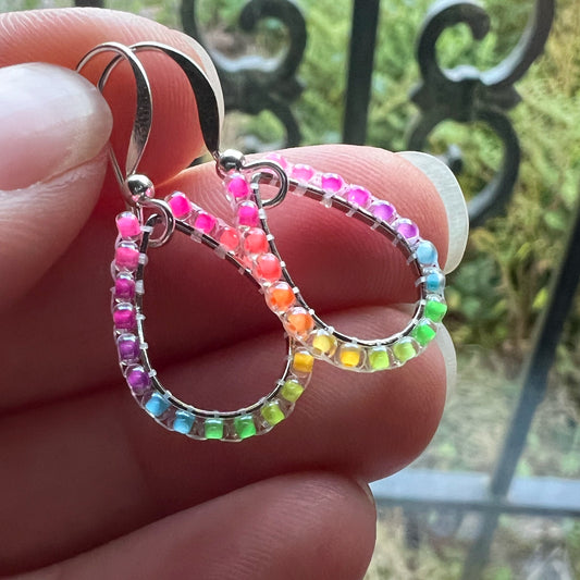 Rainbow drop earrings in florescent blacklight beads