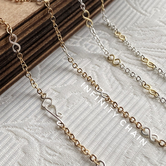 Infinity.  (silver links, gold chain)  The Celestial Collection